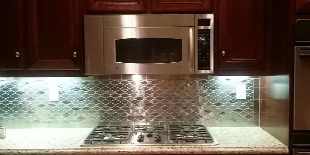 Steel tile mosaic kitchen backsplash